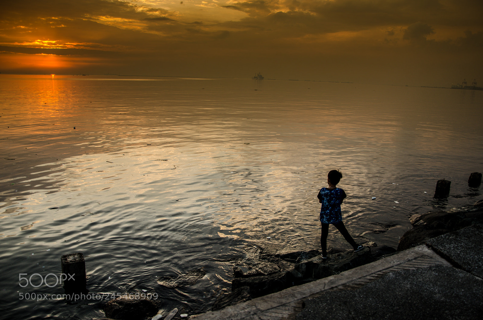 Nikon D5100 sample photo. Boy and manila bay photography