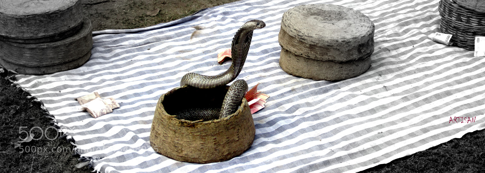 Canon PowerShot A2200 sample photo. A snake charmers setup photography