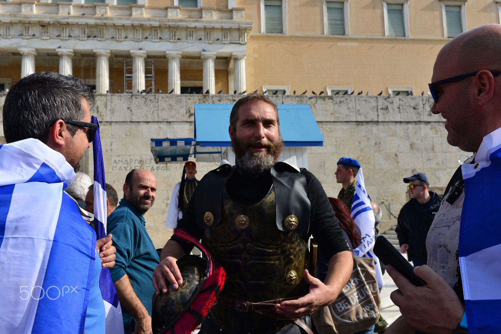 Nikon D610 + Nikon AF-S Nikkor 35mm F1.4G sample photo. "an ancient greek hero"on athens protest rally photography