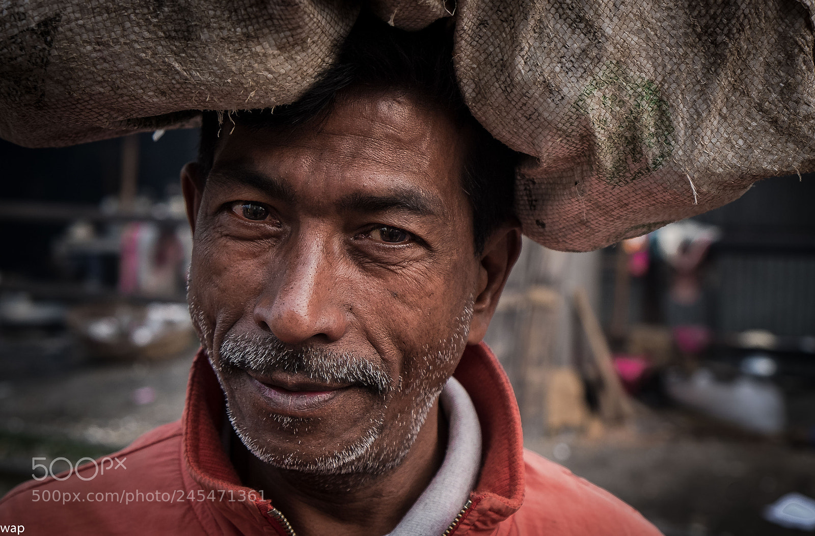 Fujifilm X-T1 sample photo. He collects throw-away plastic photography