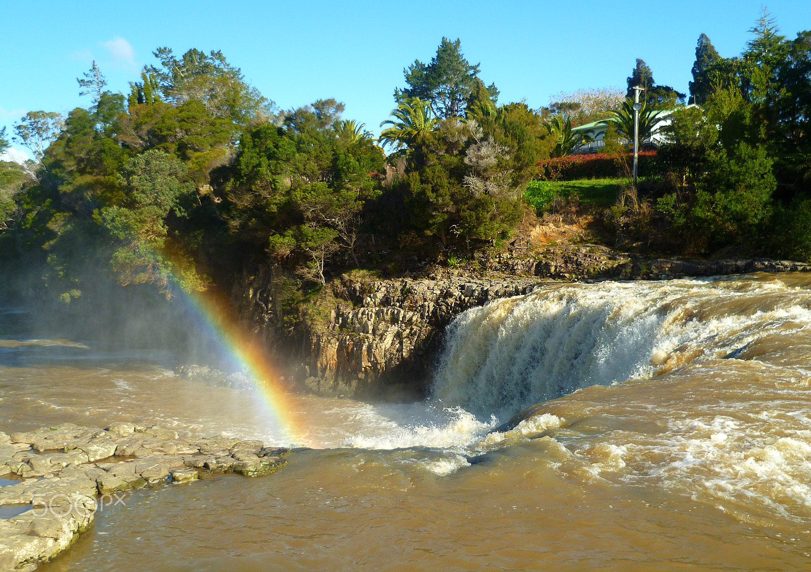 Panasonic DMC-FS11 sample photo. Rainbow over haruru falls in new zealand photography