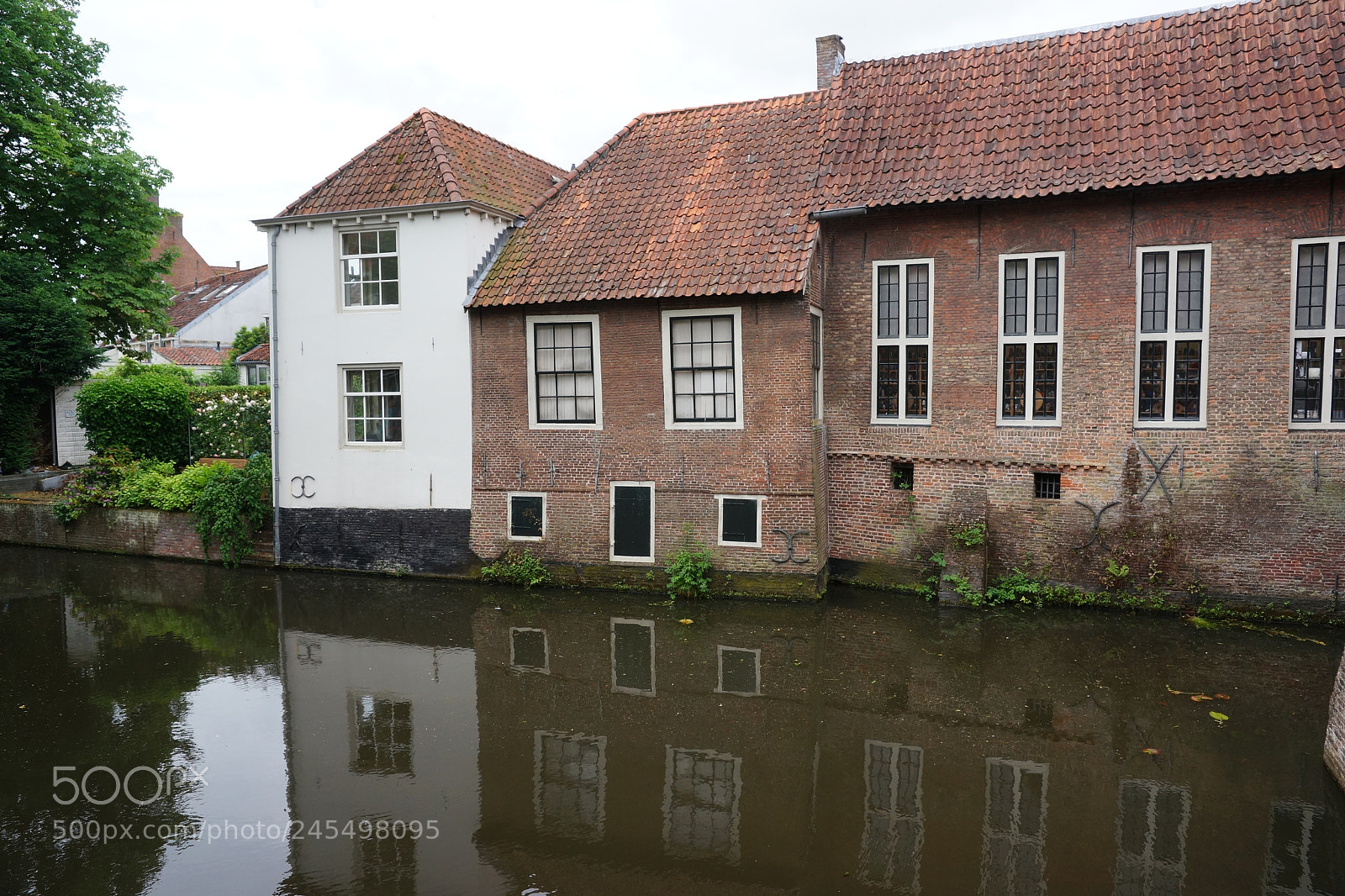 Sony SLT-A99V sample photo. Buildings along the water photography