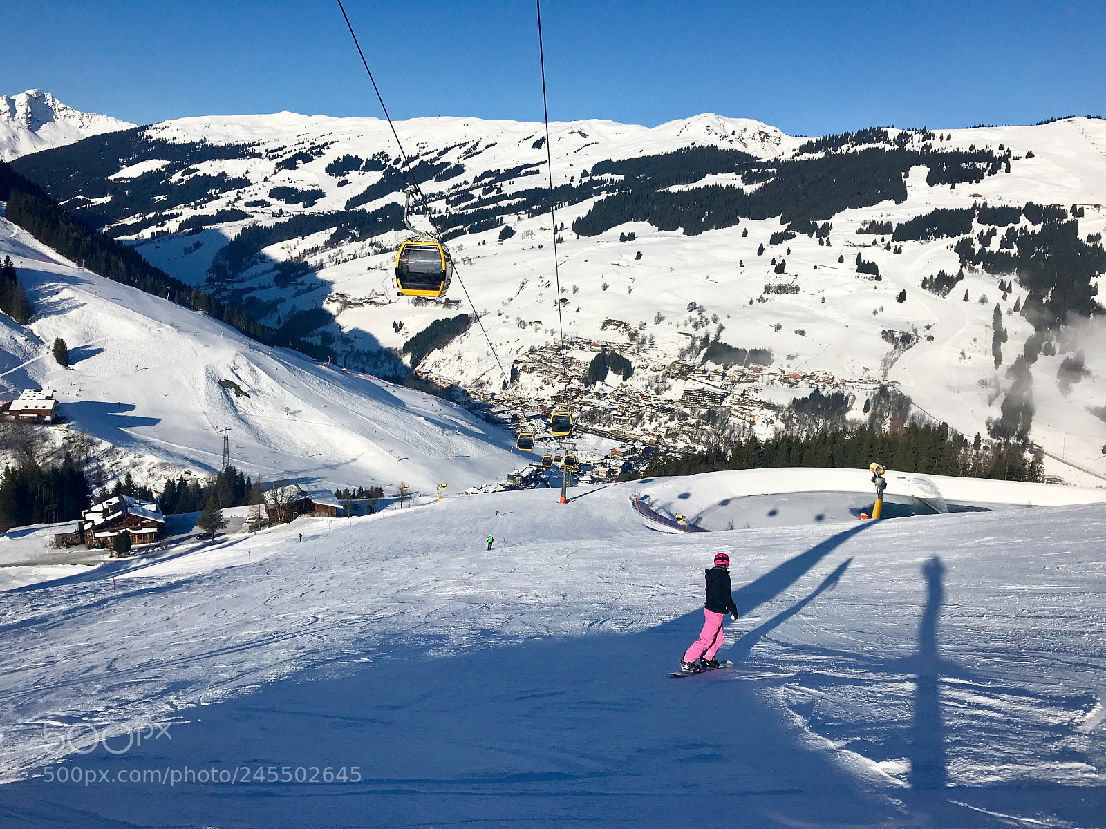 Apple iPhone 7 sample photo. Female snowboarder on piste photography