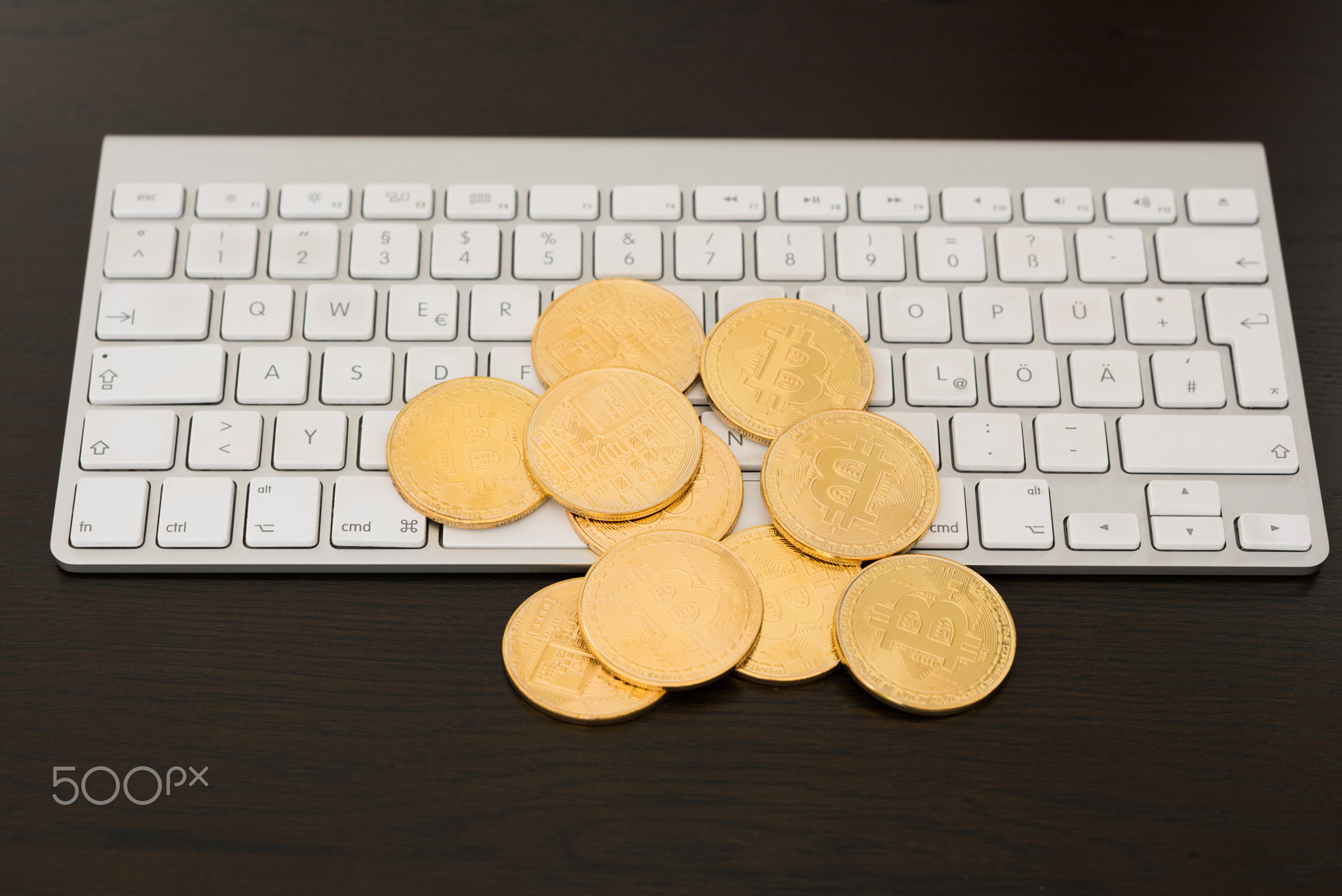 bitcoins on keyboard