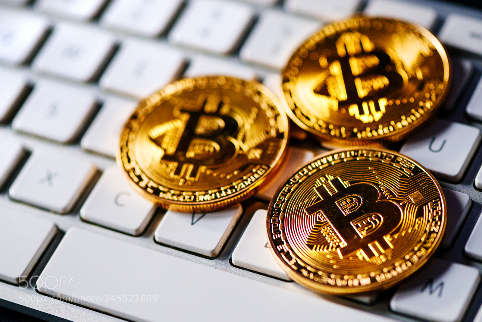 Nikon D810 sample photo. Bitcoins on computer keyboard photography