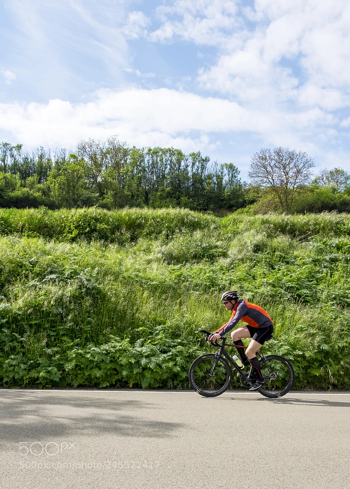Fujifilm X-T1 sample photo. Pedaling up the hill photography
