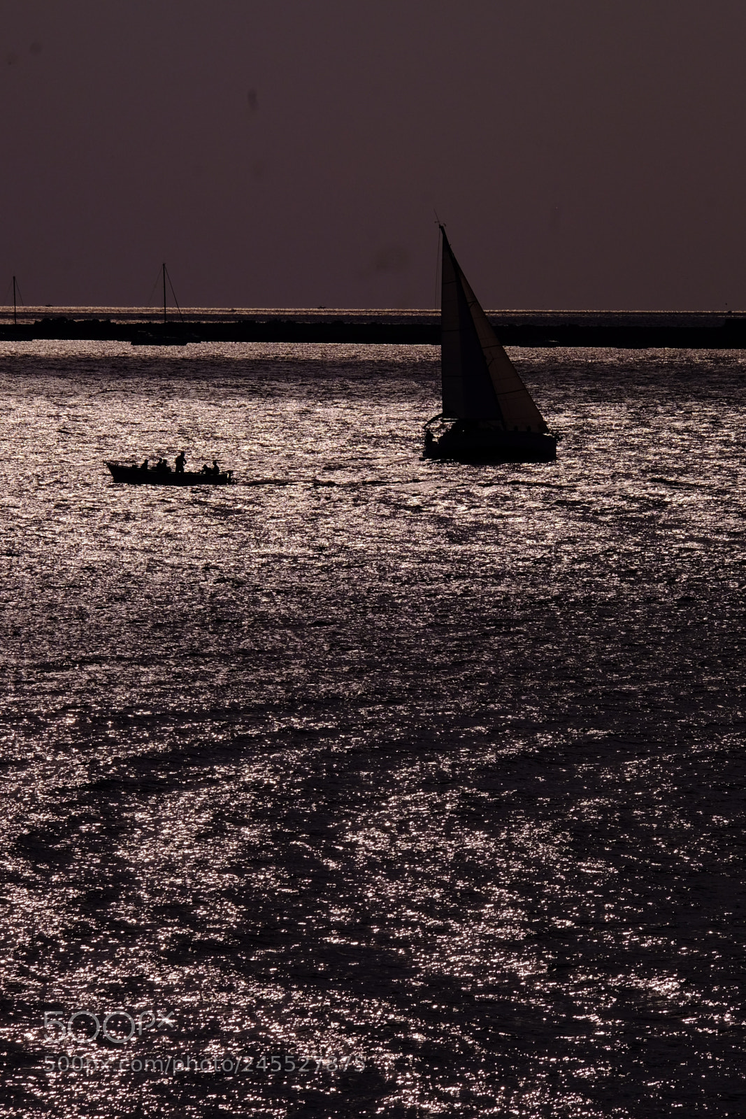 Fujifilm X-T1 sample photo. Dramatic sea back light photography