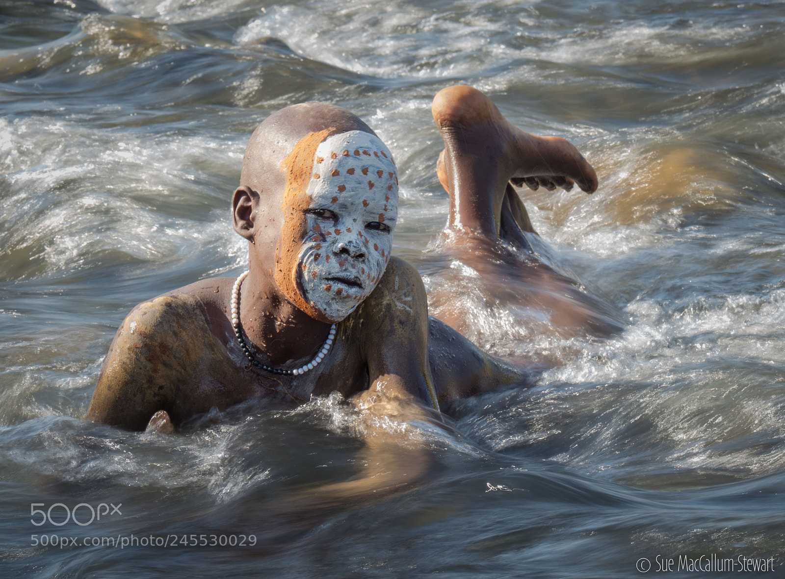 Olympus OM-D E-M1 Mark II sample photo. Suri boy river portrait photography