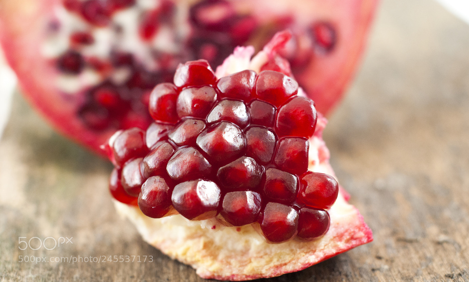 Nikon D80 sample photo. Organic pomegranate fruit on photography