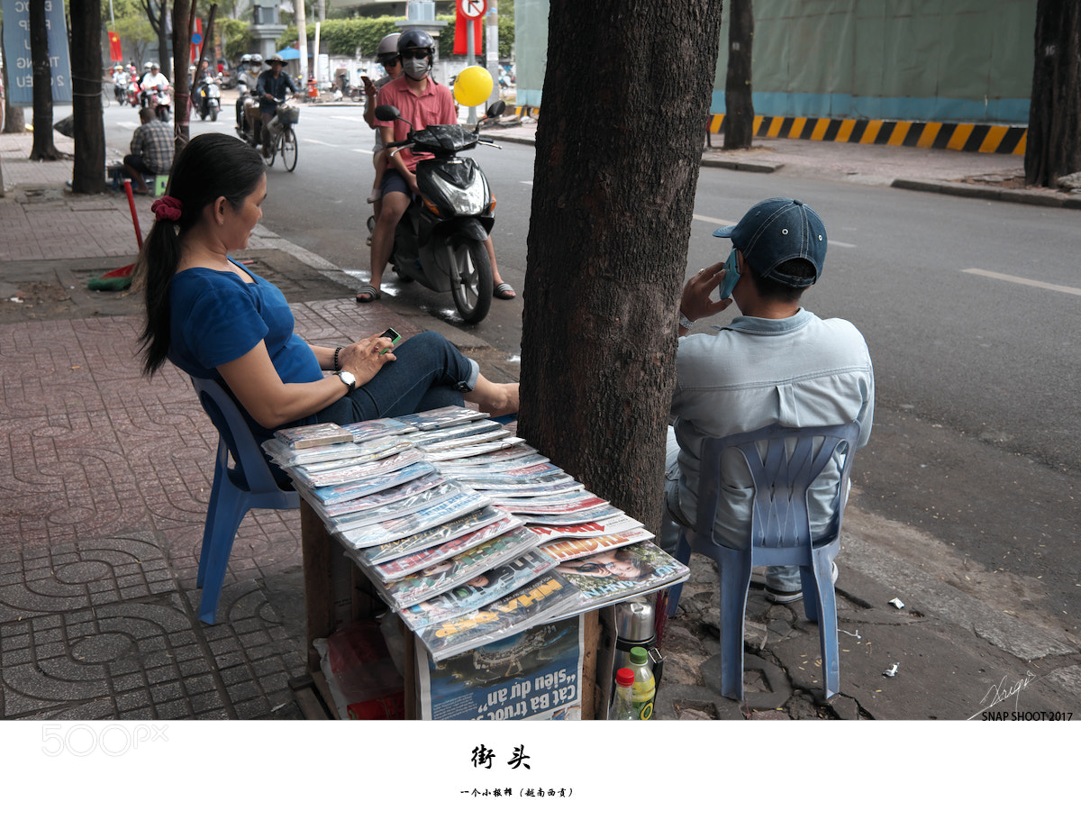 Fujifilm X70 sample photo. 街頭報攤 photography