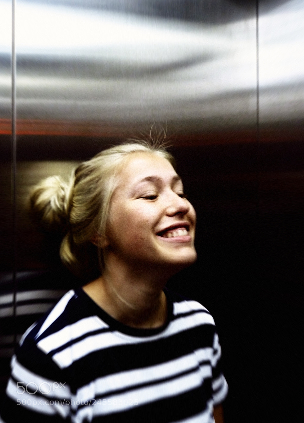 Panasonic Lumix DMC-FZ28 sample photo. Judith in elevator photography