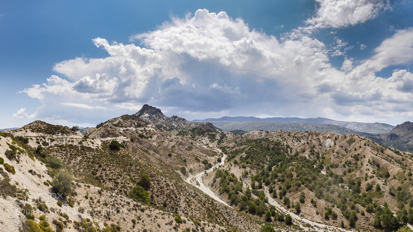 Olympus OM-D E-M10 sample photo. Thunderstorm developing over cerro photography