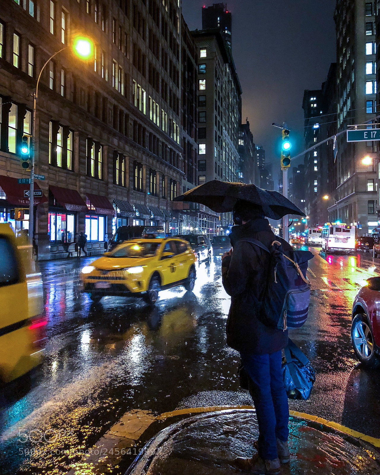 Apple iPhone X sample photo. Man in rain photography
