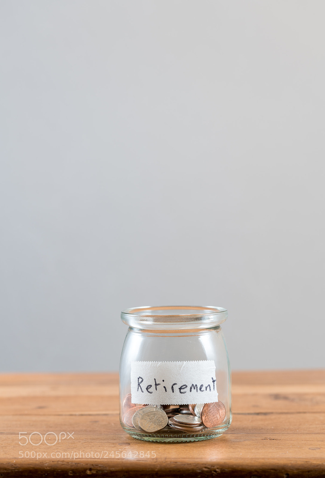 Sony a7R II sample photo. Loose change inside glass photography