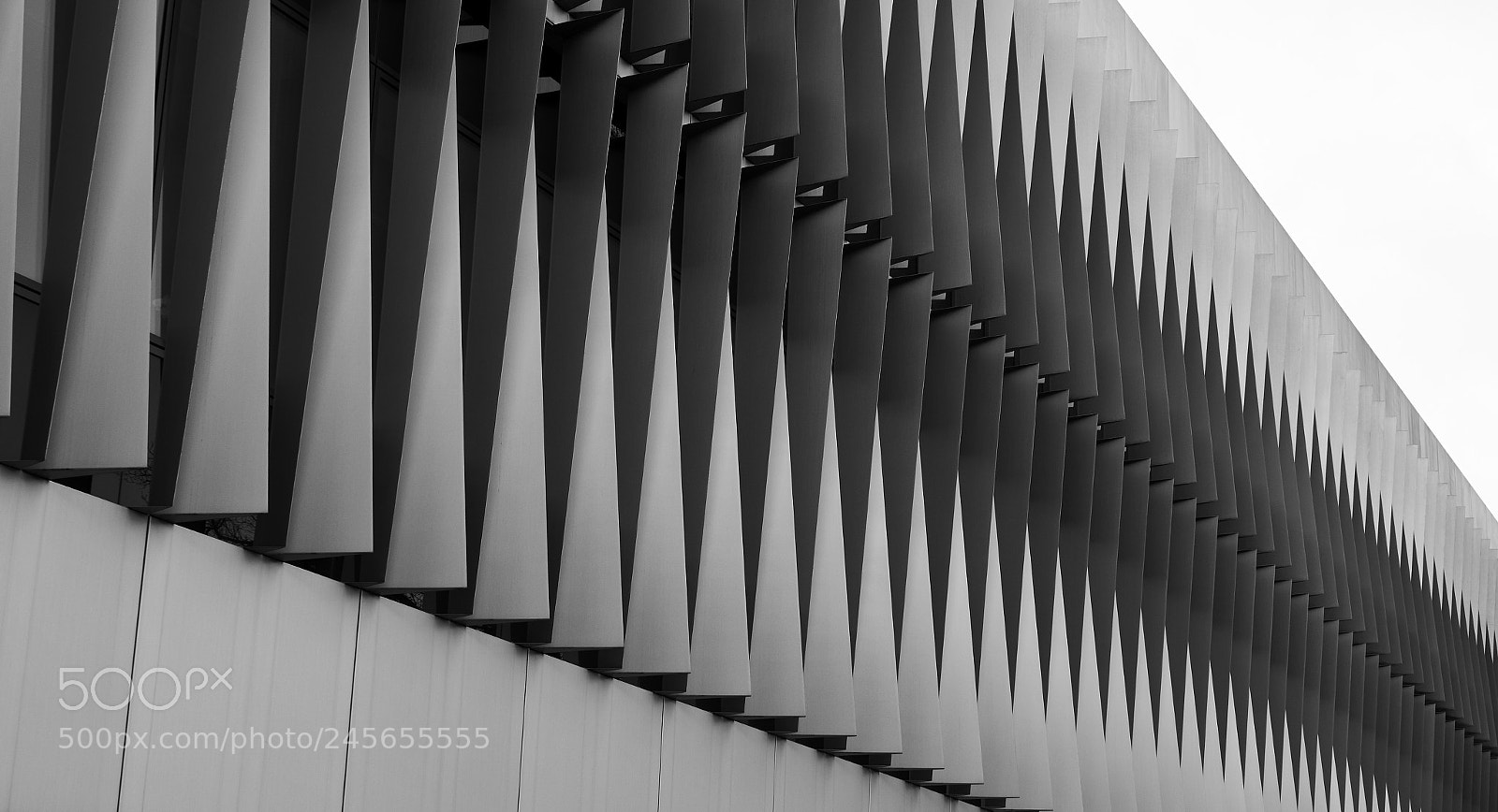 Sony Cyber-shot DSC-RX10 III sample photo. Triangles on wall photography