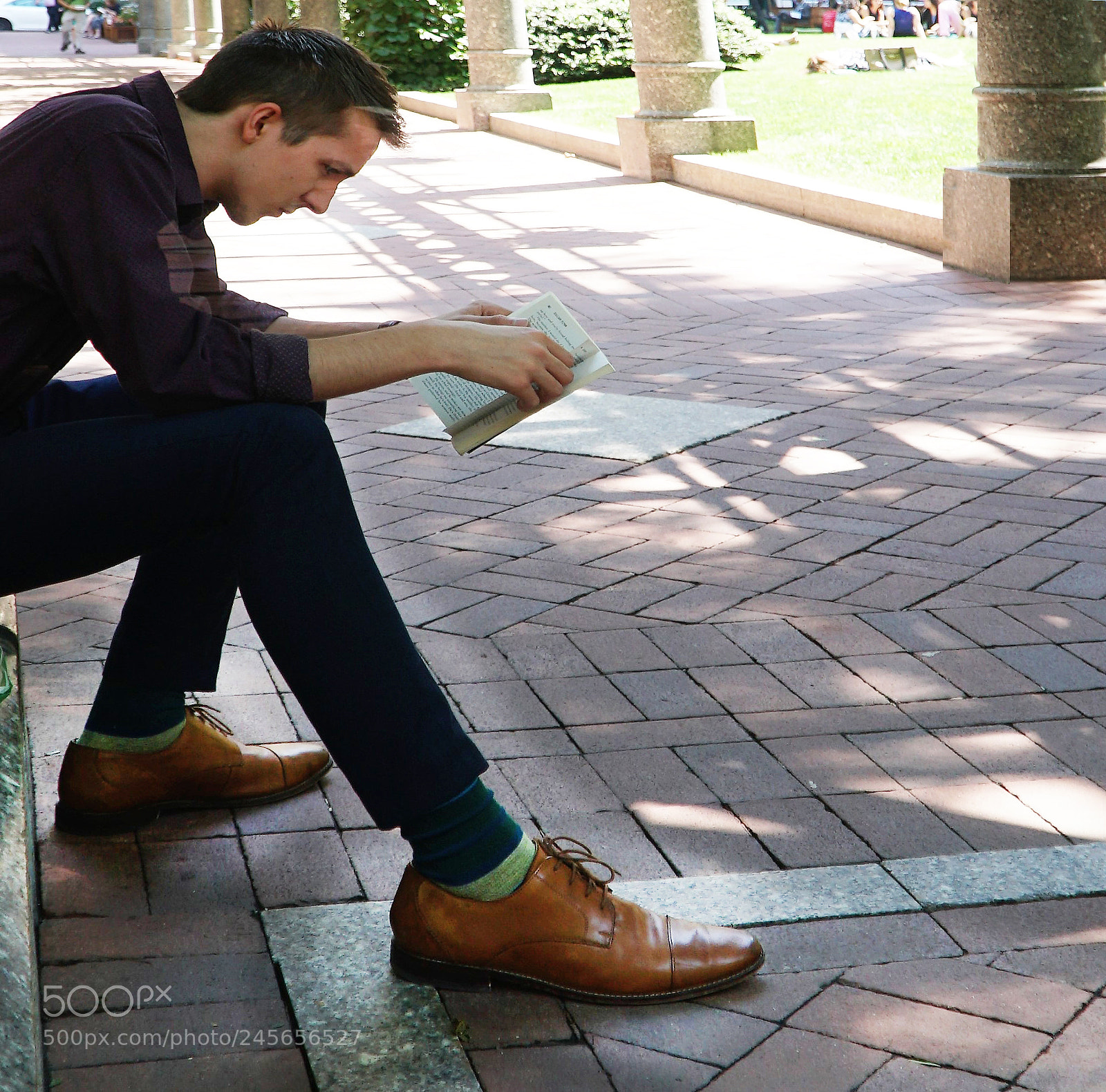 Sony a6500 sample photo. Big foot reading a photography