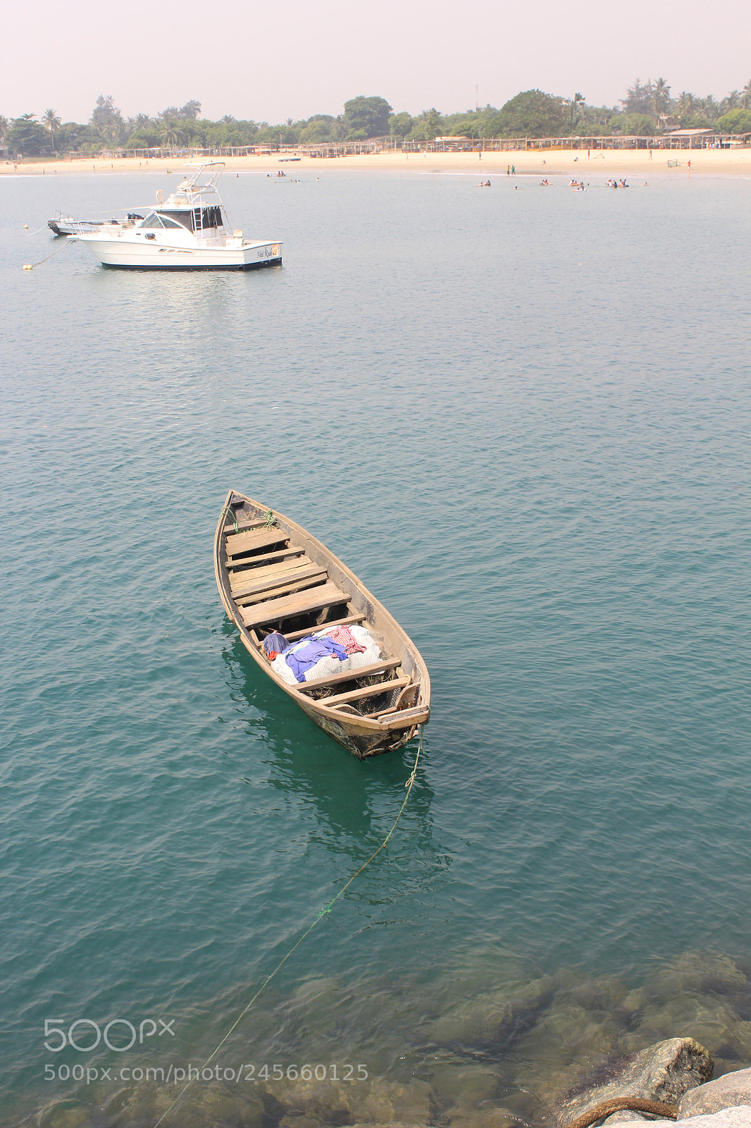 Canon EF-S 18-55mm F3.5-5.6 III sample photo. Wooden and speed boat photography