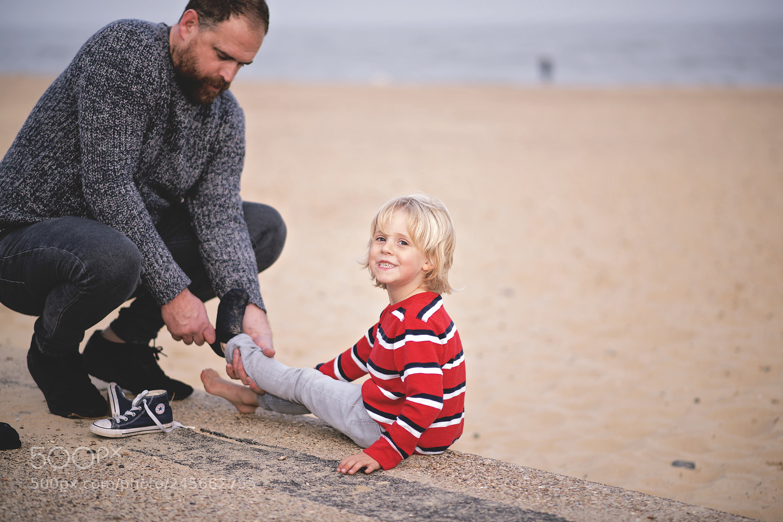 Nikon D810 sample photo. Daddy helping with shoes photography