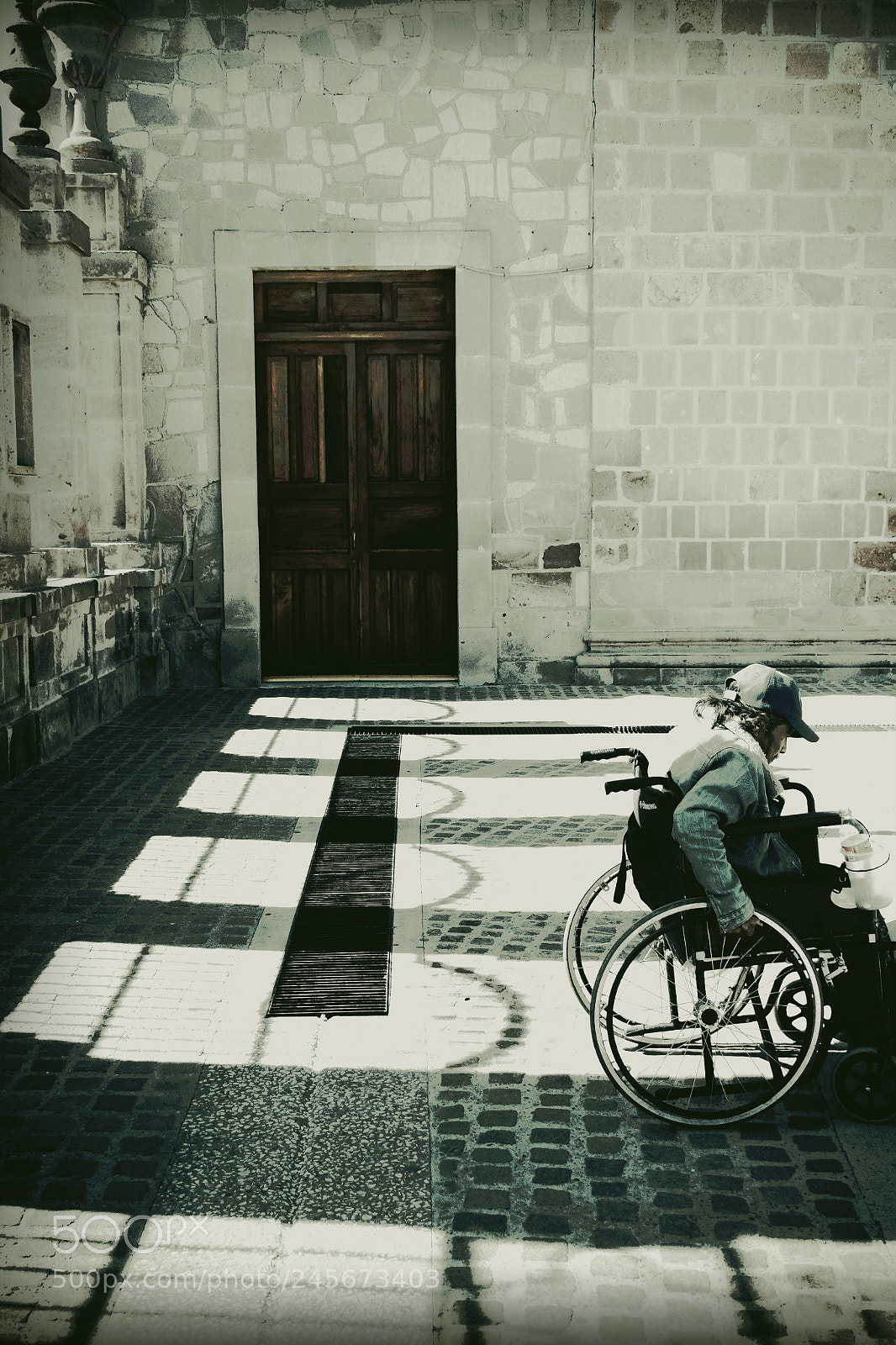 Nikon D5600 sample photo. Man in wheelchair photography