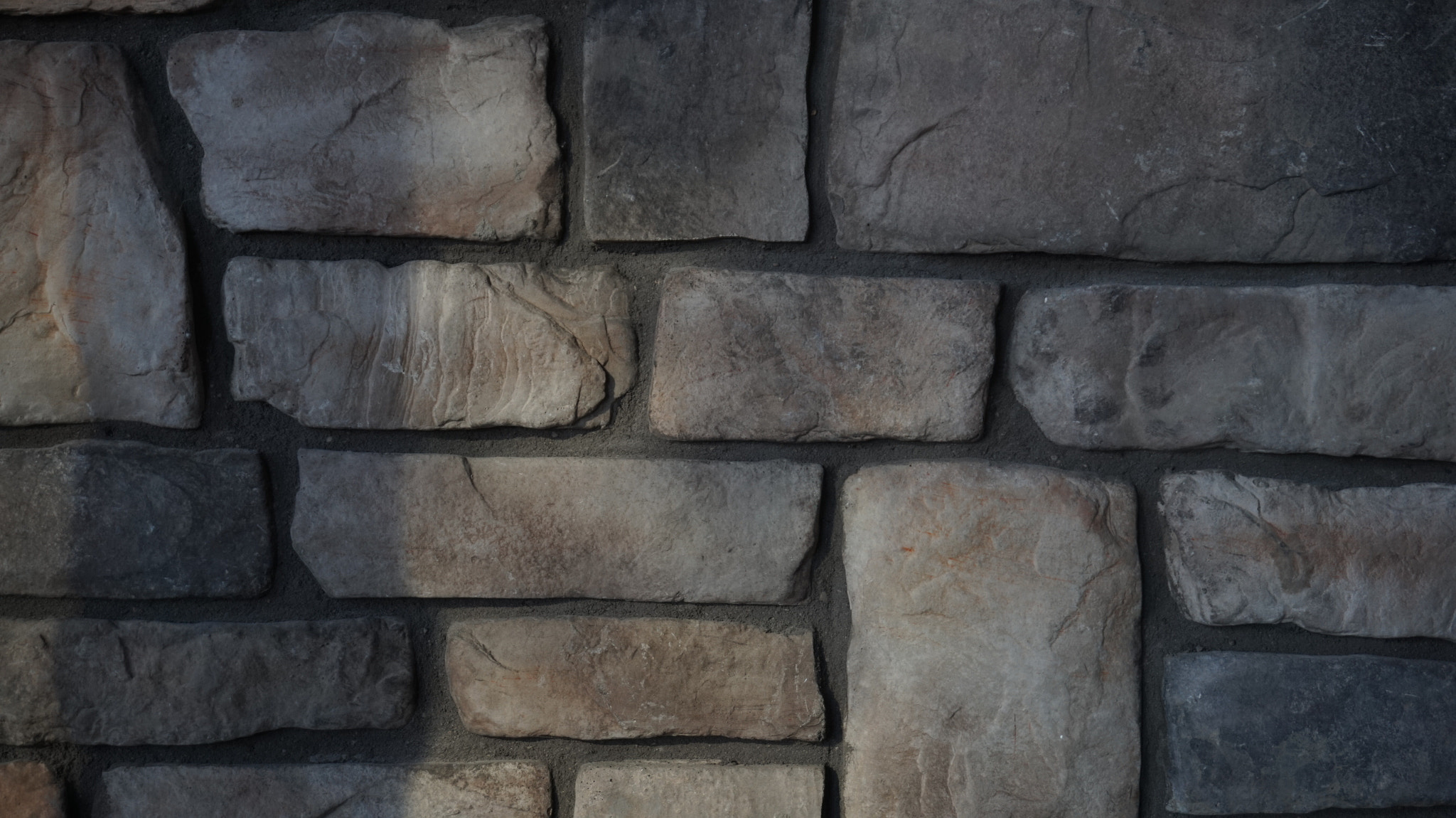 Sony Alpha a5000 (ILCE 5000) + Sony E 18-50mm F4-5.6 sample photo. Stone work wall photography