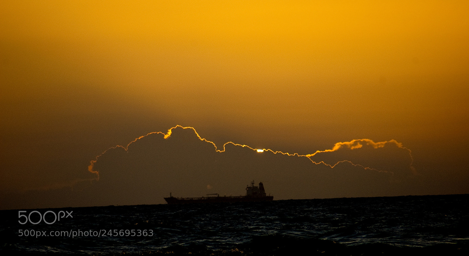 Nikon D40 sample photo. Cloud silhouette during sunset photography