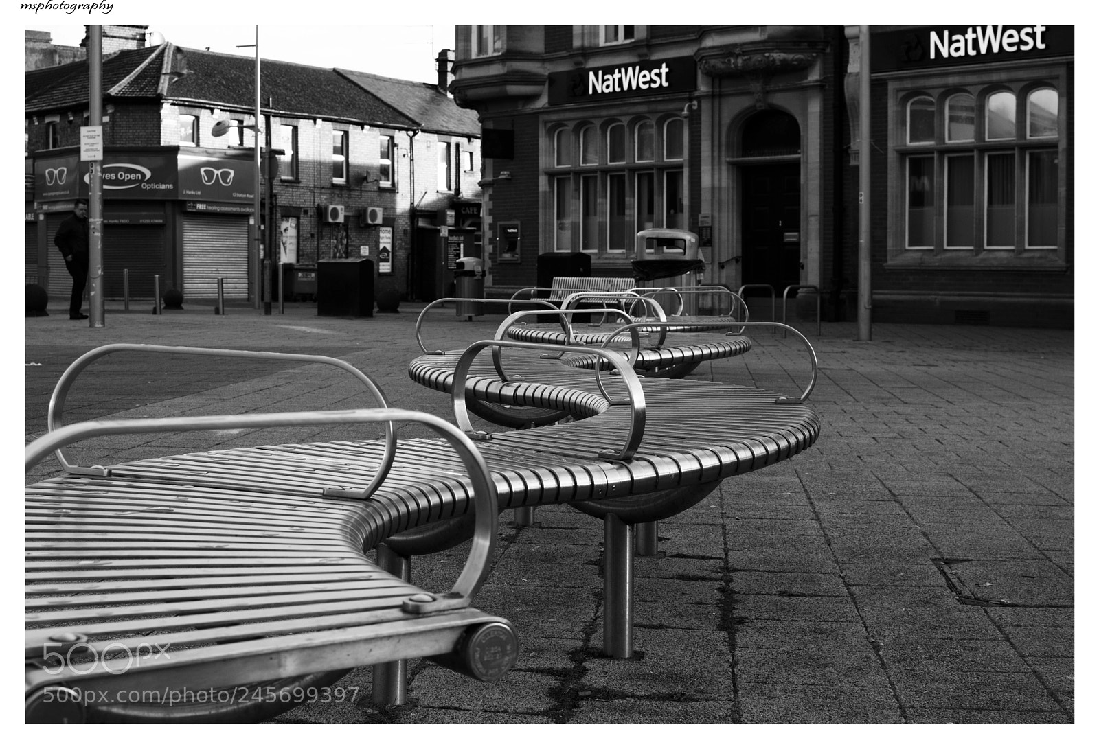 Nikon D5200 sample photo. Wavy silver bench photography