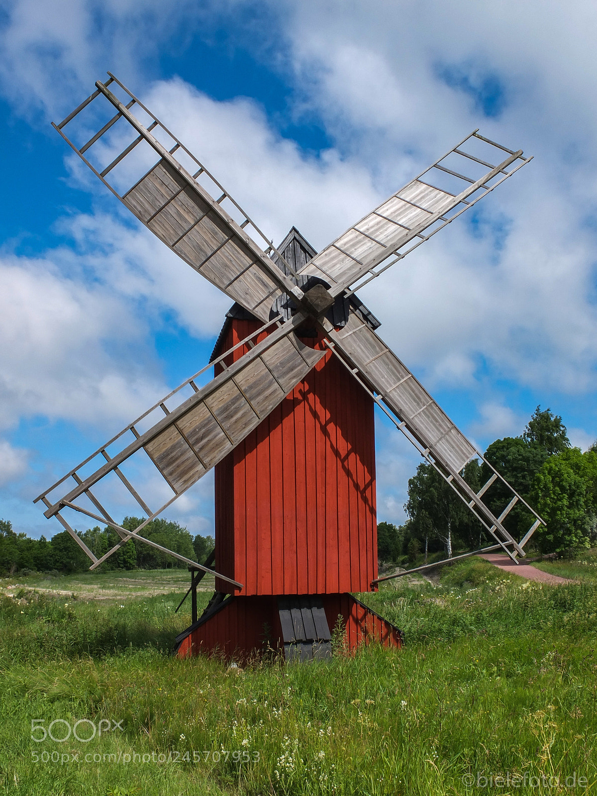 Fujifilm X10 sample photo. Windmill in sweden photography