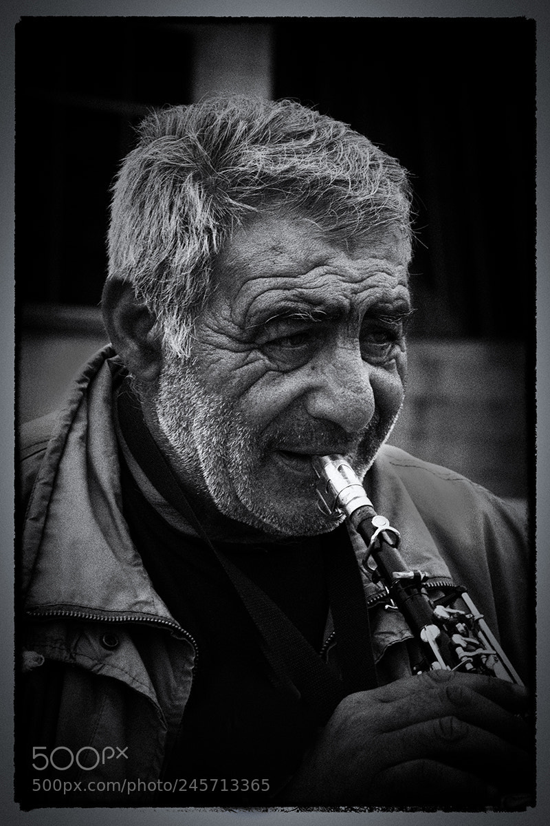 Nikon D7100 sample photo. Blowing for tips photography