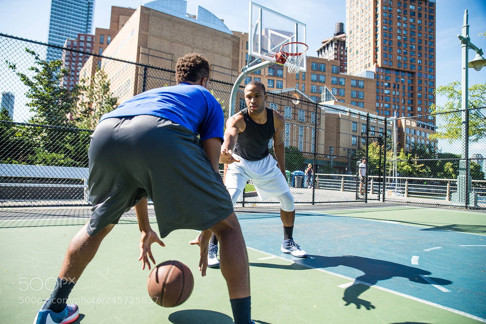 Nikon D610 sample photo. Basketball player playing outdoors photography