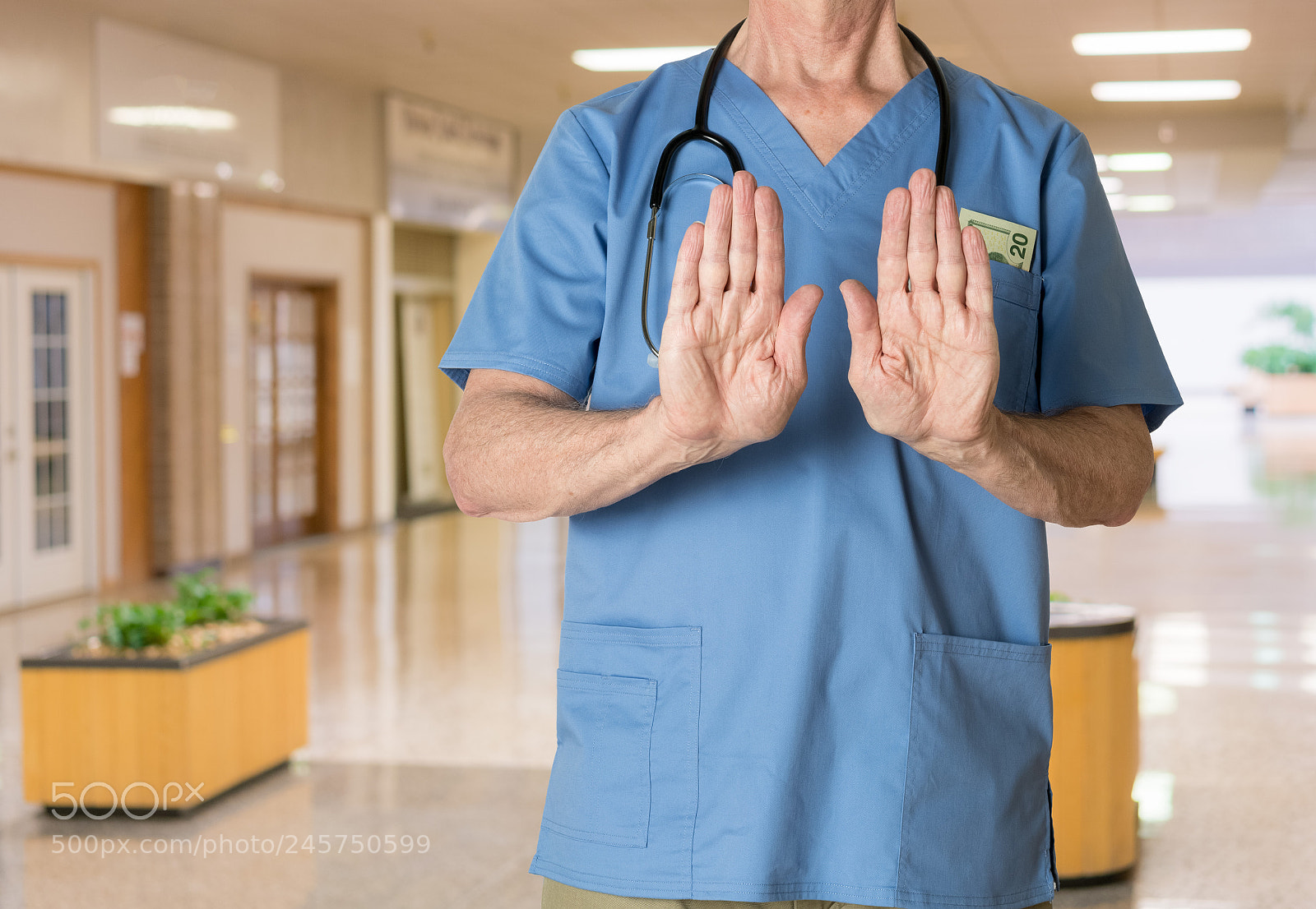 Sony a7R II sample photo. Senior doctor in scrubs photography
