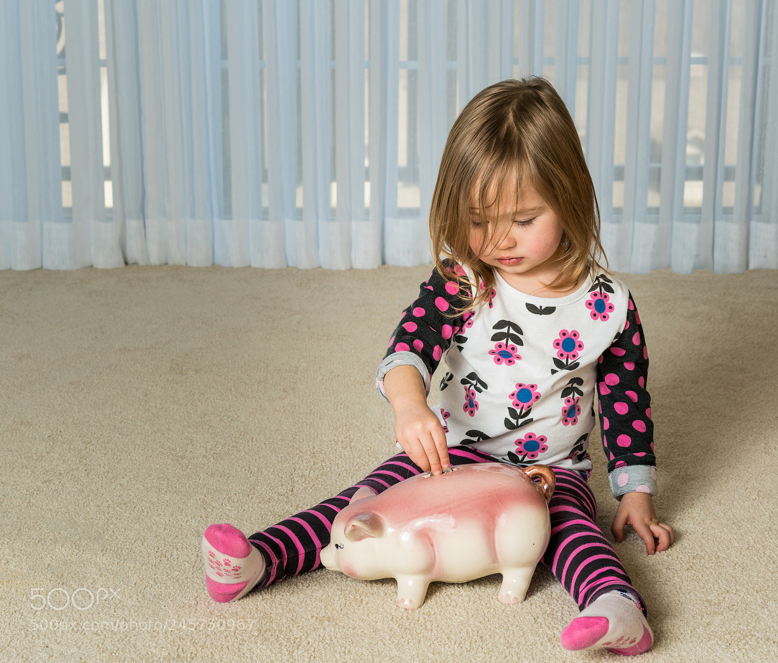 Sony a7R II sample photo. Young toddler putting money photography