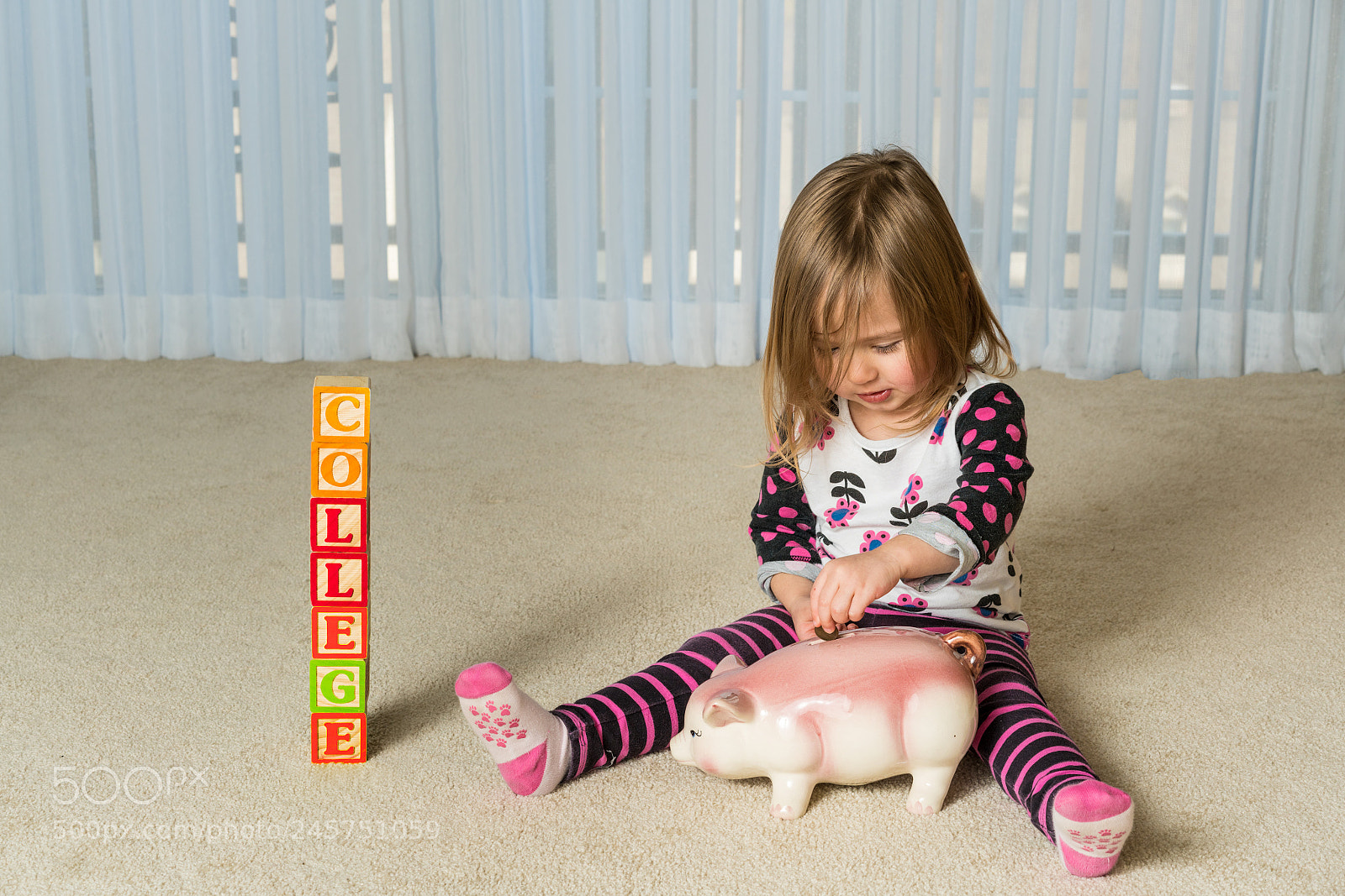 Sony a7R II sample photo. Young toddler putting money photography