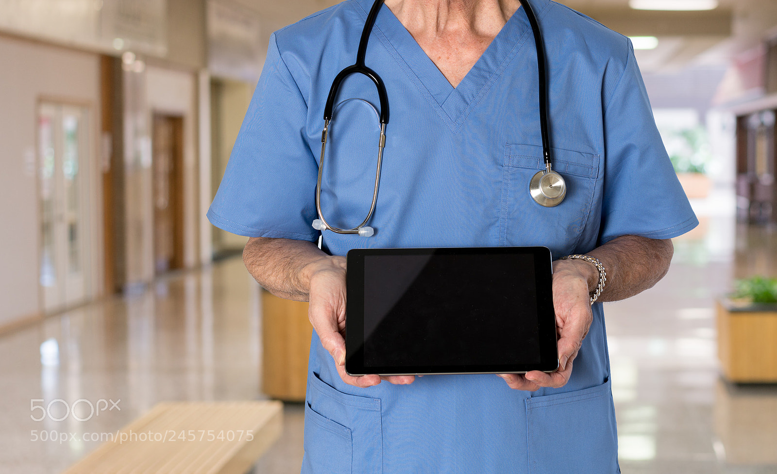 Sony a7R II sample photo. Senior doctor in scrubs photography