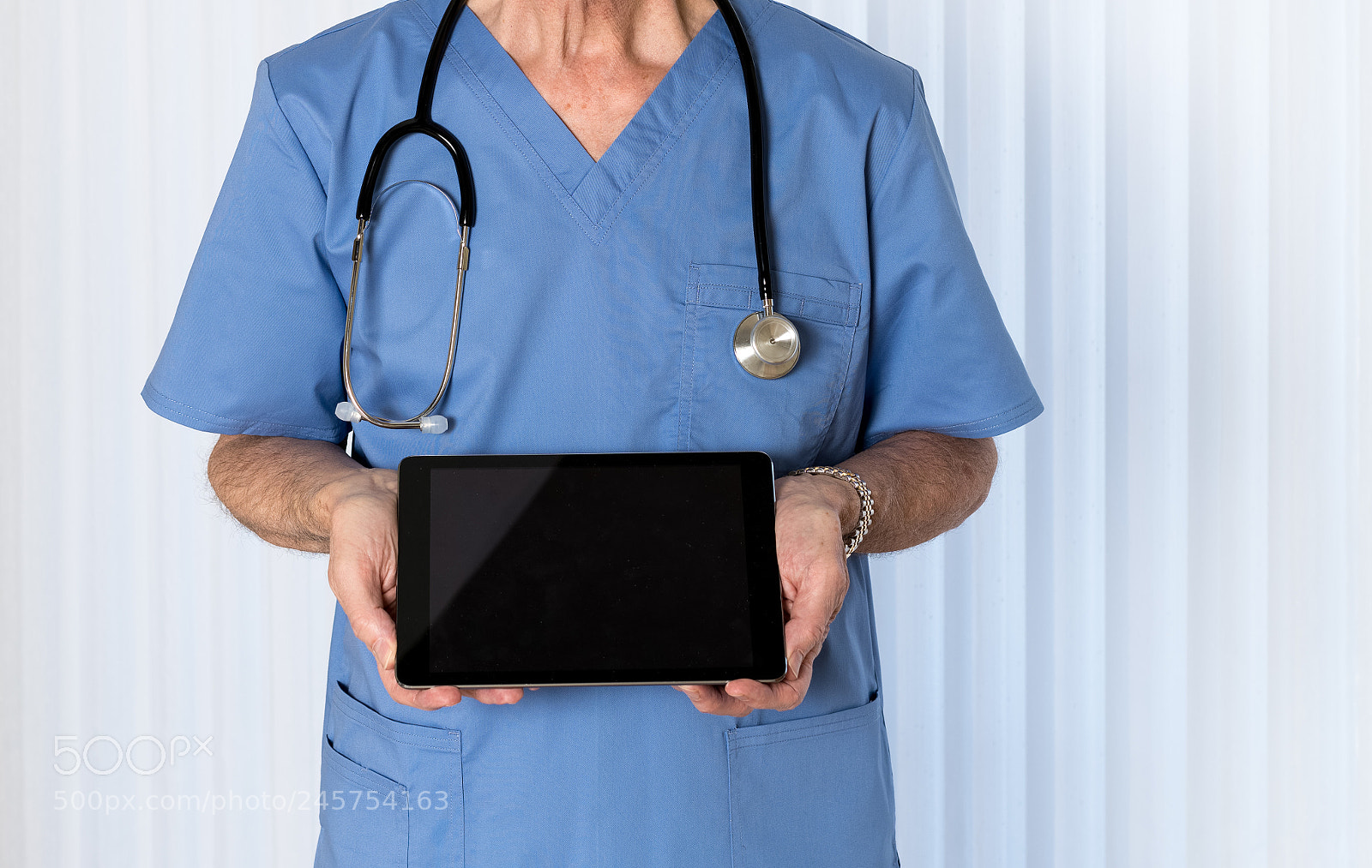 Sony a7R II sample photo. Senior doctor in scrubs photography