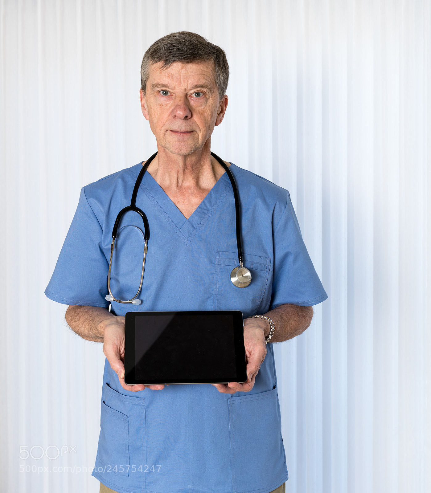 Sony a7R II sample photo. Senior doctor in scrubs photography