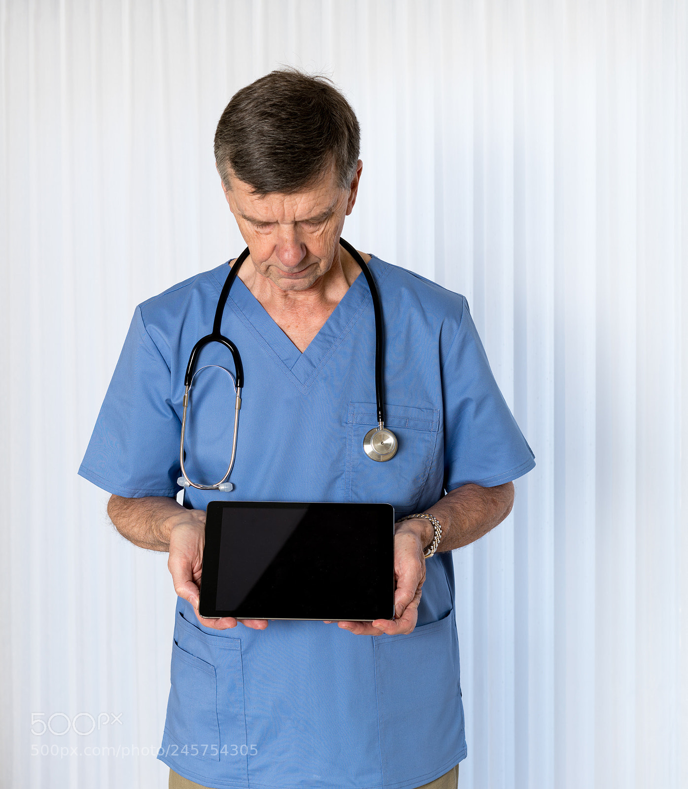 Sony a7R II sample photo. Senior doctor in scrubs photography