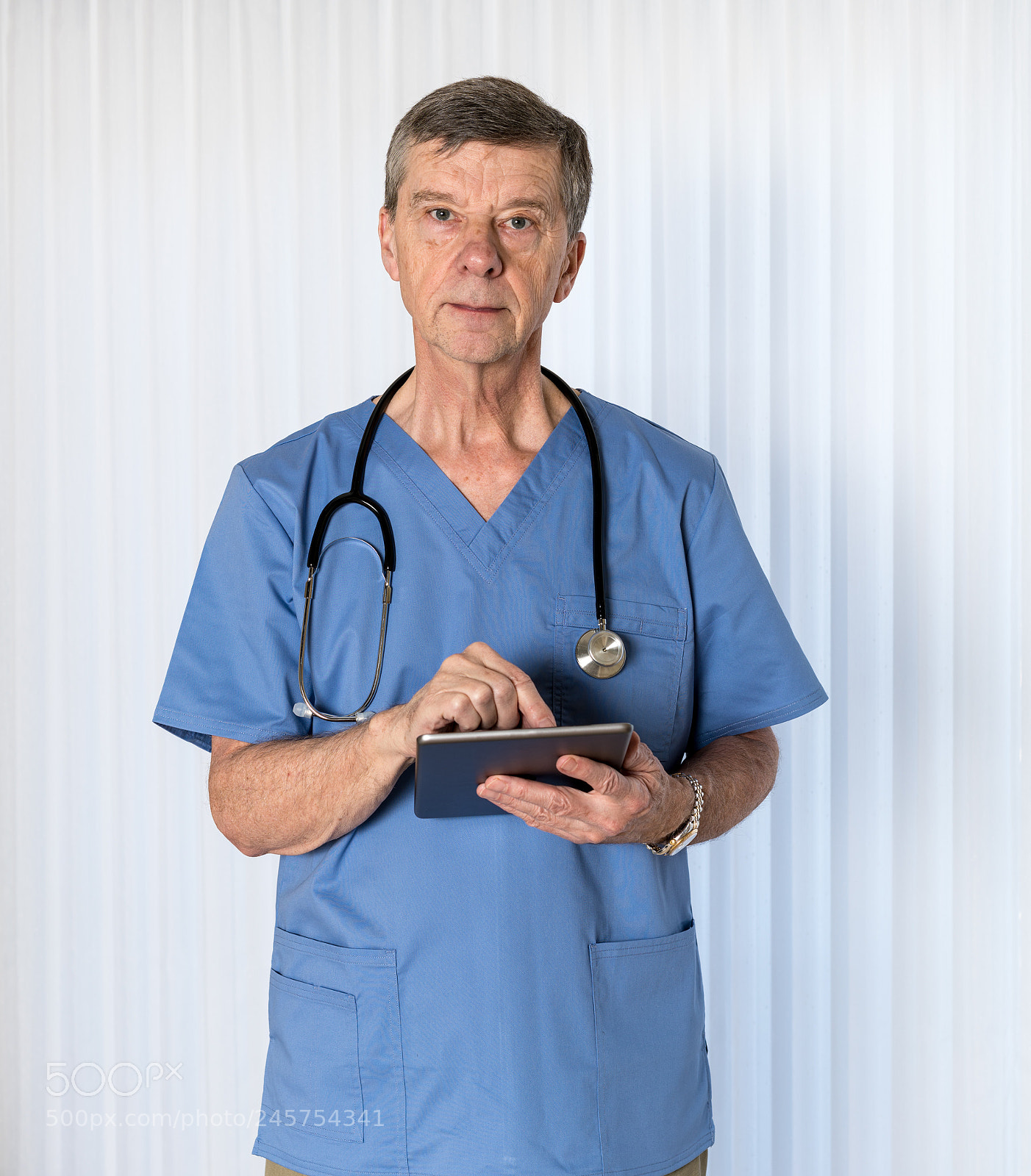 Sony a7R II sample photo. Senior doctor in scrubs photography