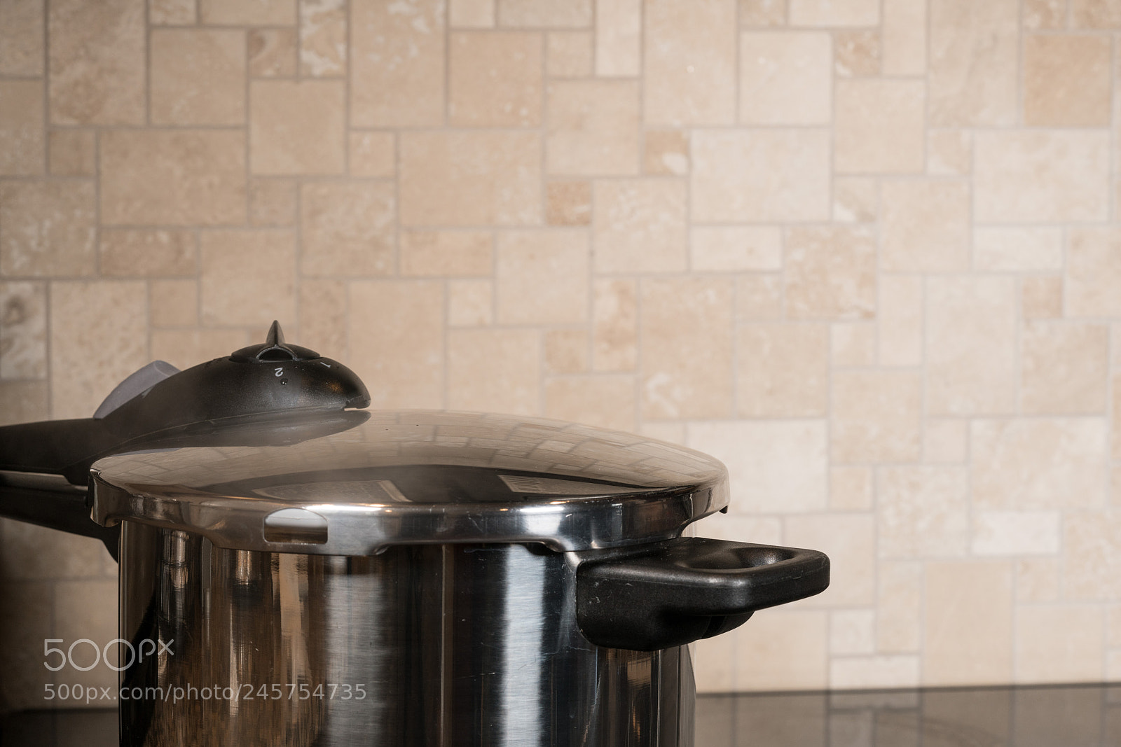 Sony a7R II sample photo. Stainless steel pressure cooker photography