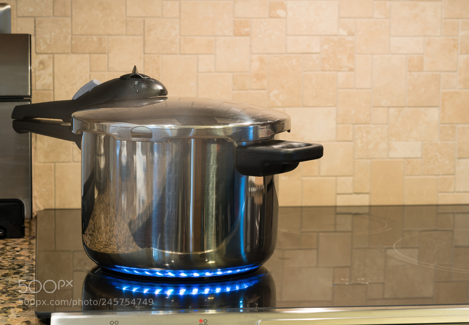 Sony a7R II sample photo. Stainless steel pressure cooker photography