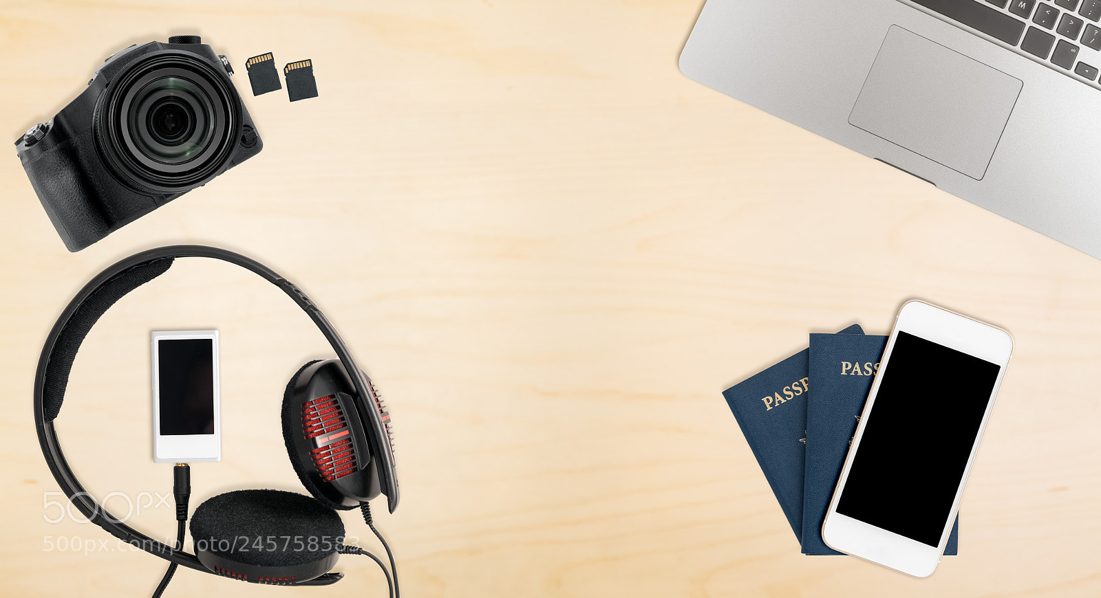 Sony a7R II sample photo. Clean wooden desk with photography