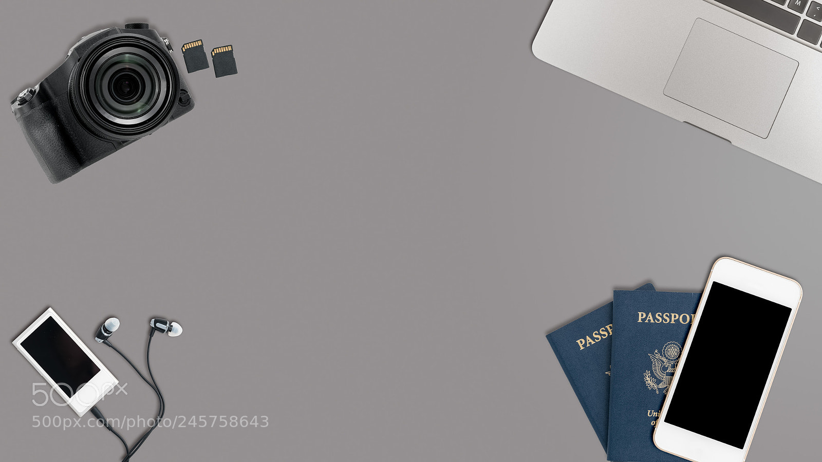 Sony a7R II sample photo. Clean grey desk with photography