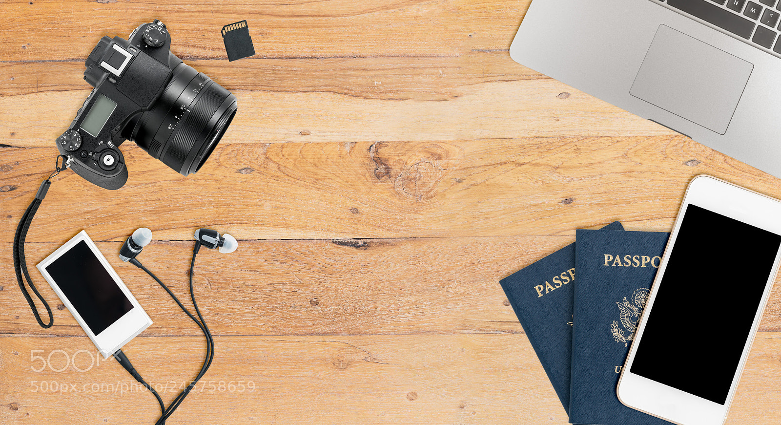 Sony a7R II sample photo. Clean wooden desk with photography
