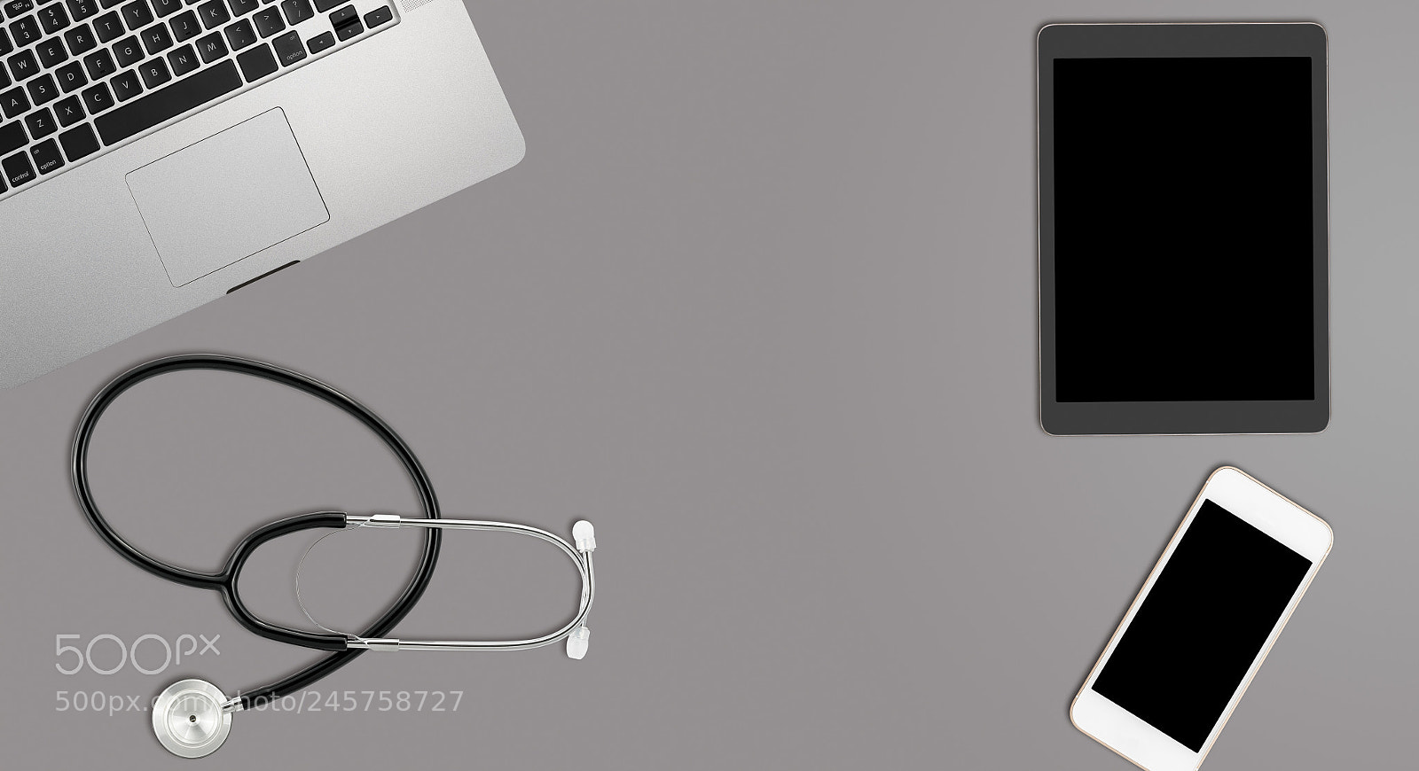 Sony a7R II sample photo. Clean grey desk with photography