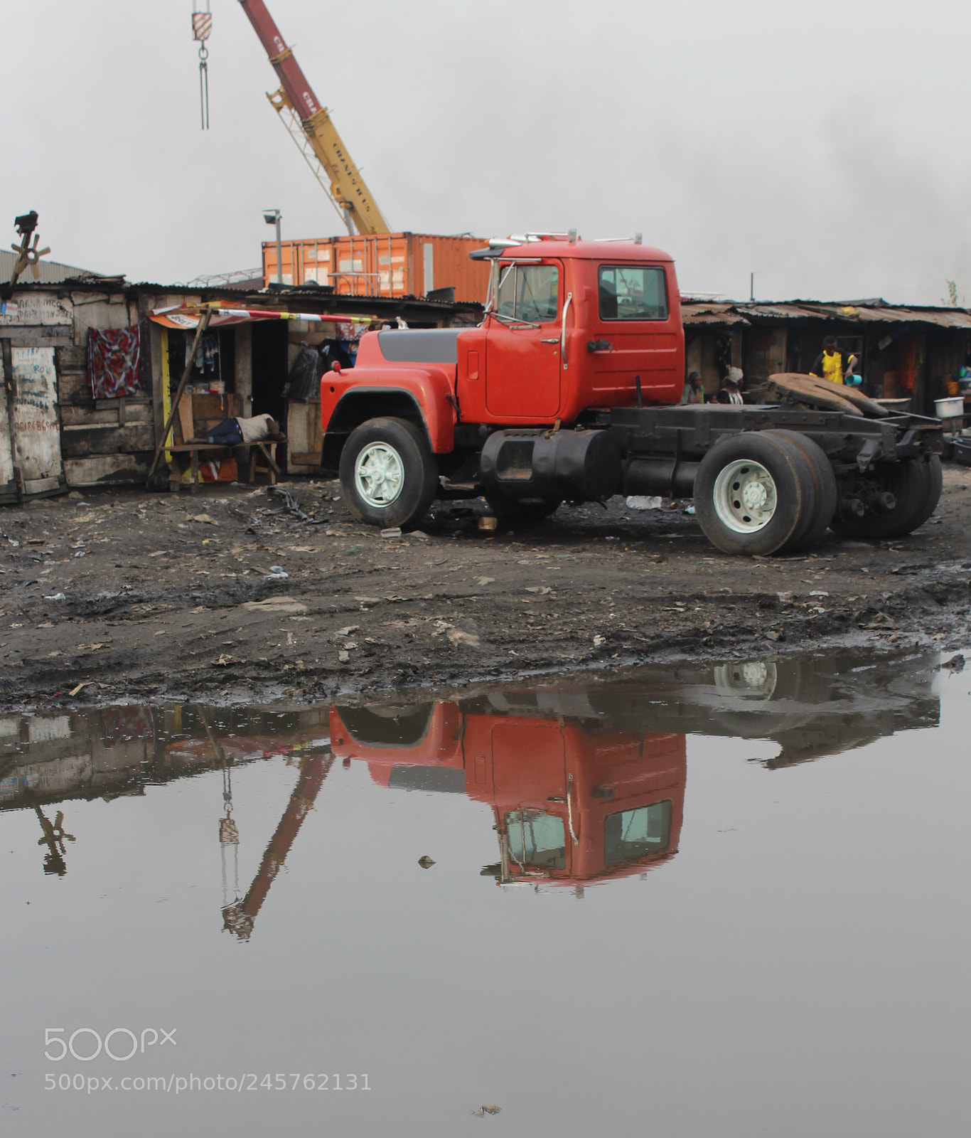 Canon EF-S 18-55mm F3.5-5.6 III sample photo. Red truck reflection photography
