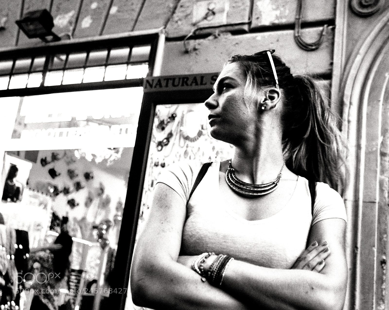 Sony a6500 sample photo. Woman looking toward the photography
