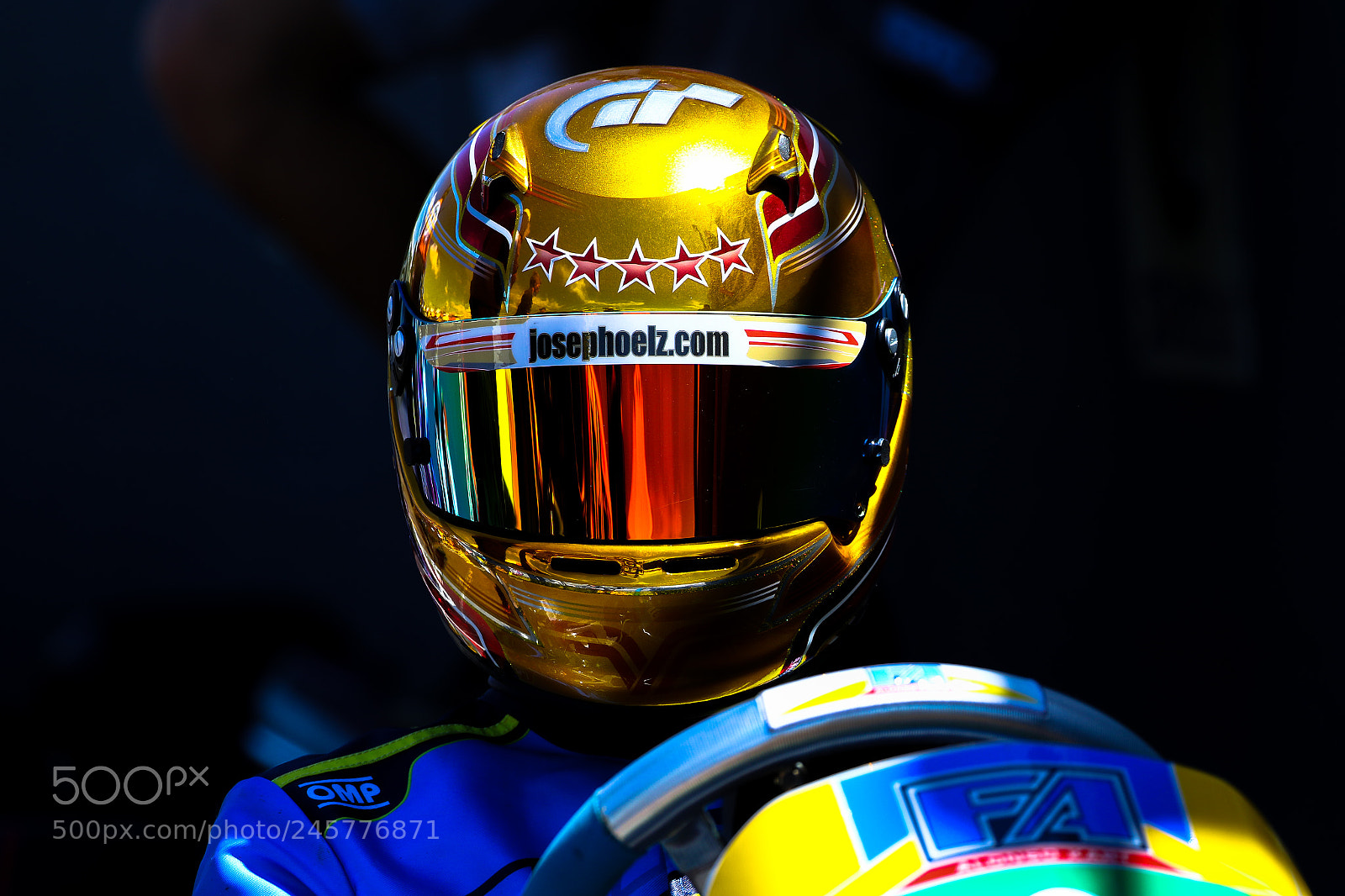 Canon EOS 7D Mark II sample photo. Golden racing helmet photography