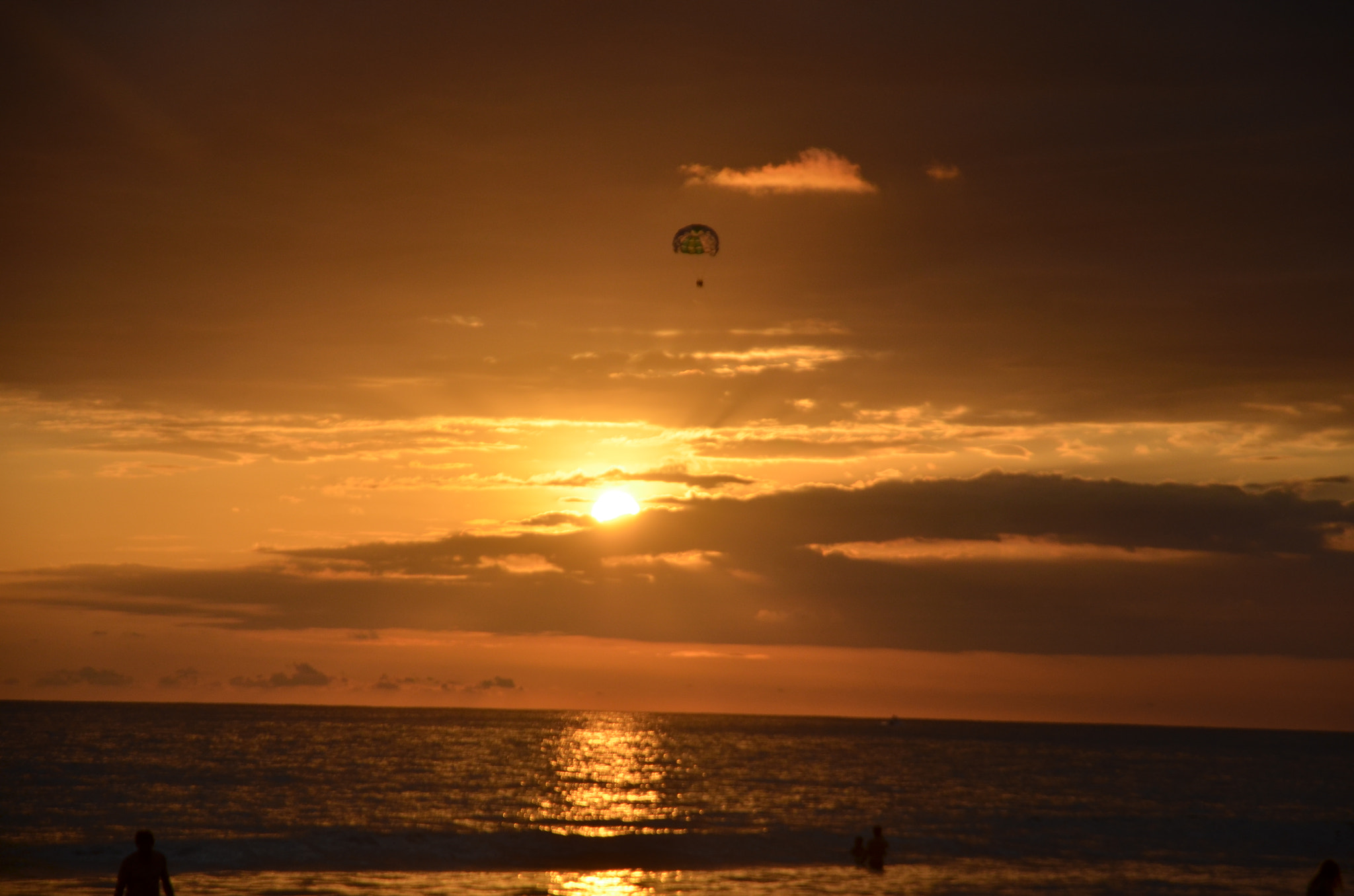 Nikon D5100 sample photo. Sunset from beach with paraglide photography