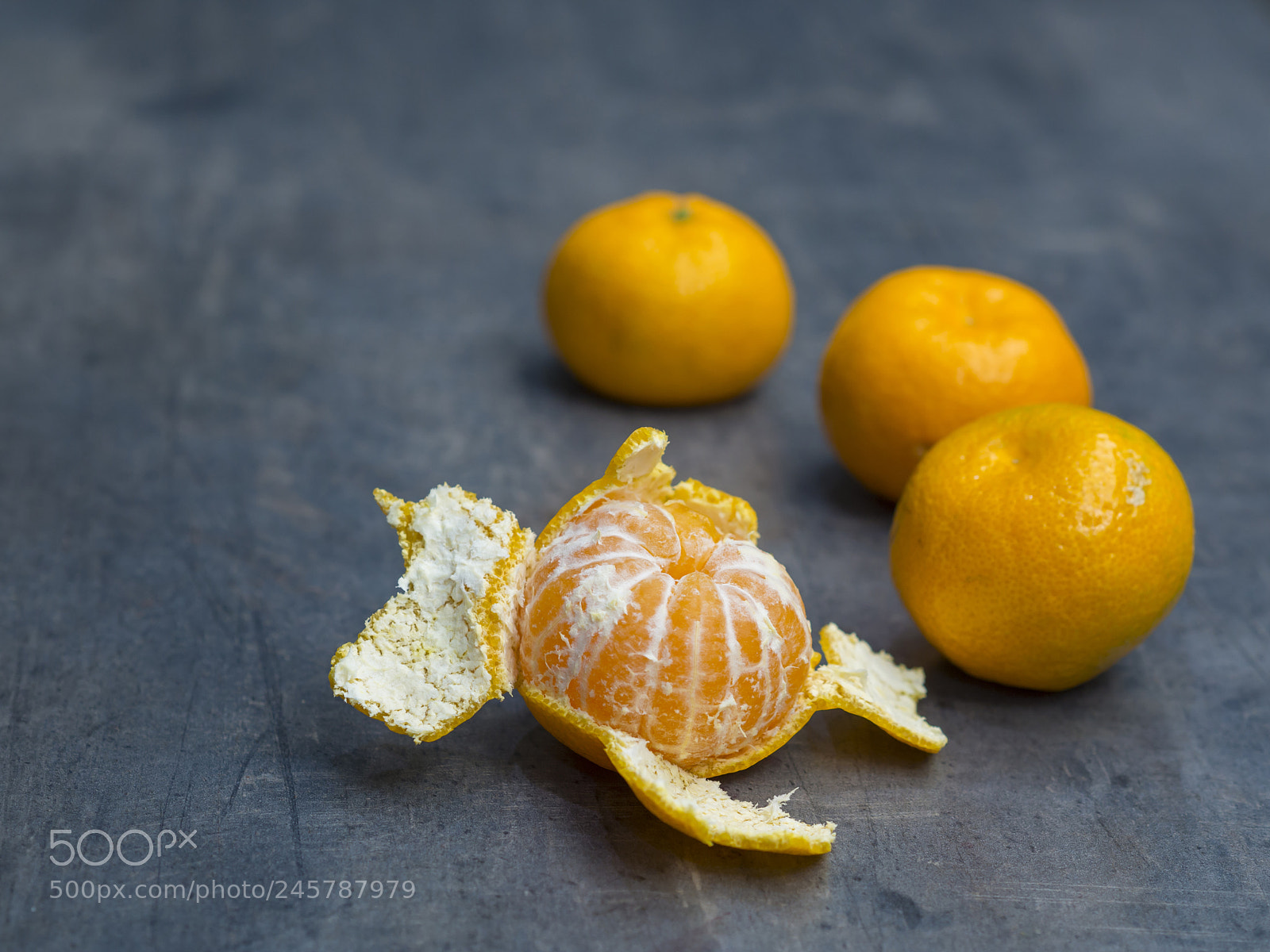 Olympus OM-D E-M10 sample photo. Four close up tangerine photography