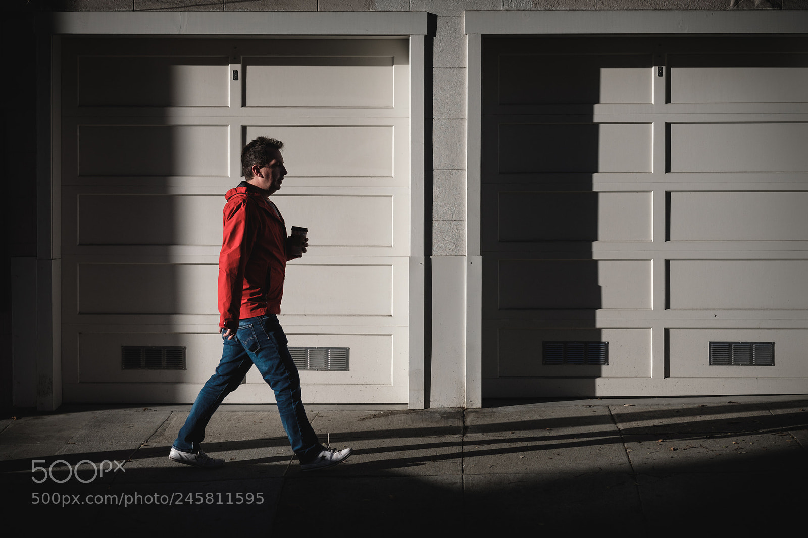 Fujifilm X-T20 sample photo. Red man walking photography