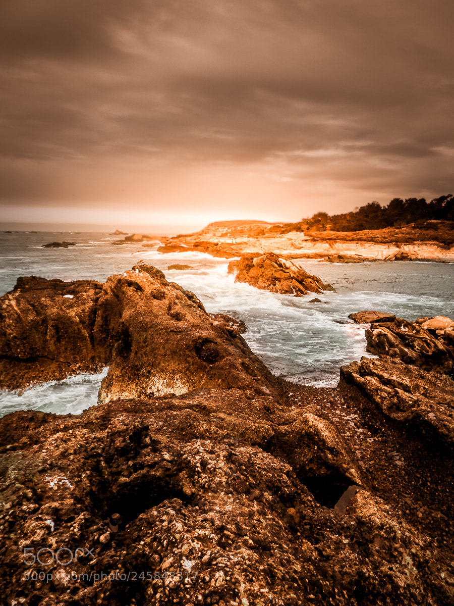 Panasonic Lumix DMC-FZ200 sample photo. Rocky shore at ano photography